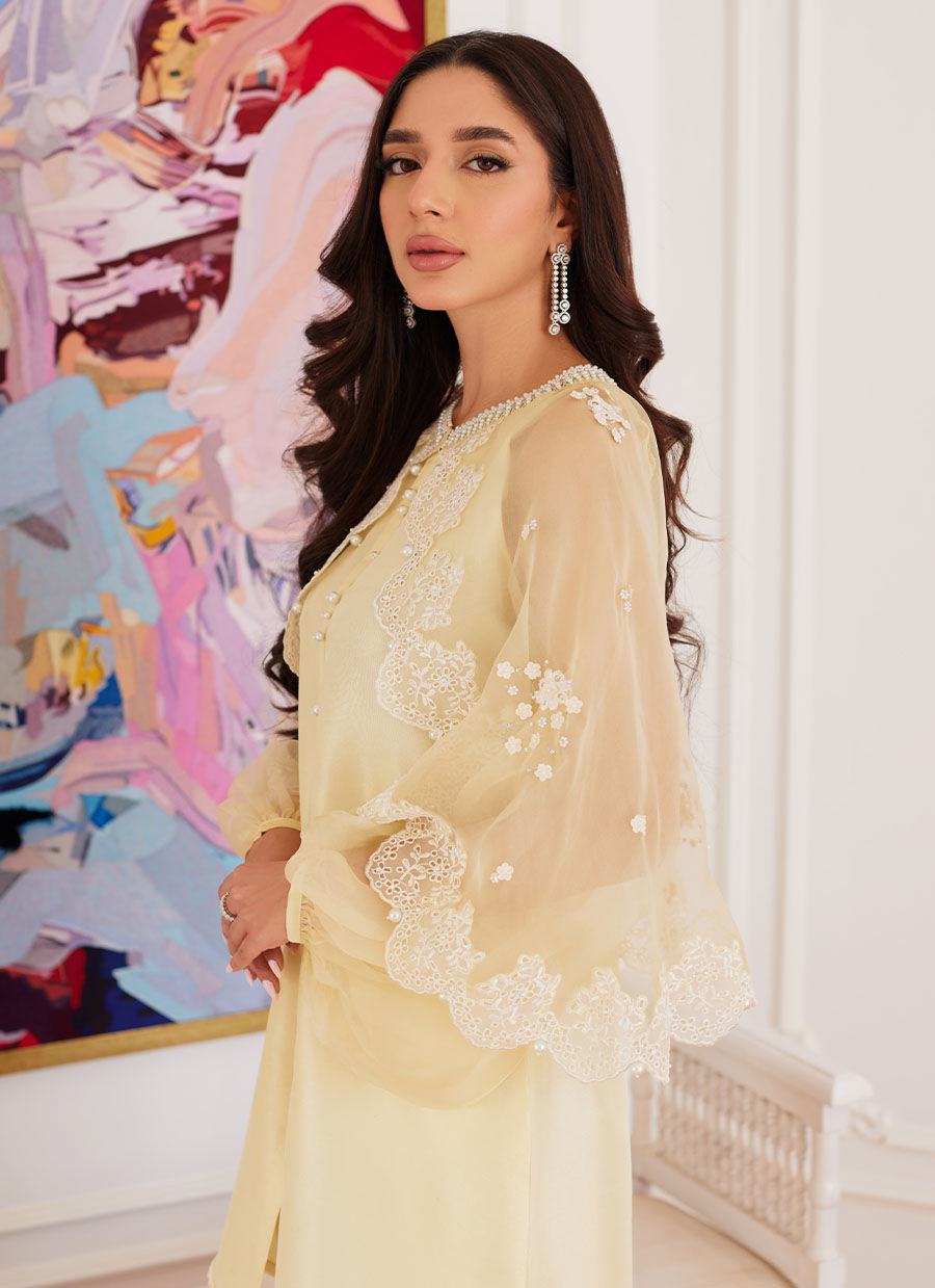 ESMERALDA PASTEL YELLOW RAW SILK SHIRT WITH ATTACHED CAPE- Luna Eid'24 | By Farah Talib Aziz