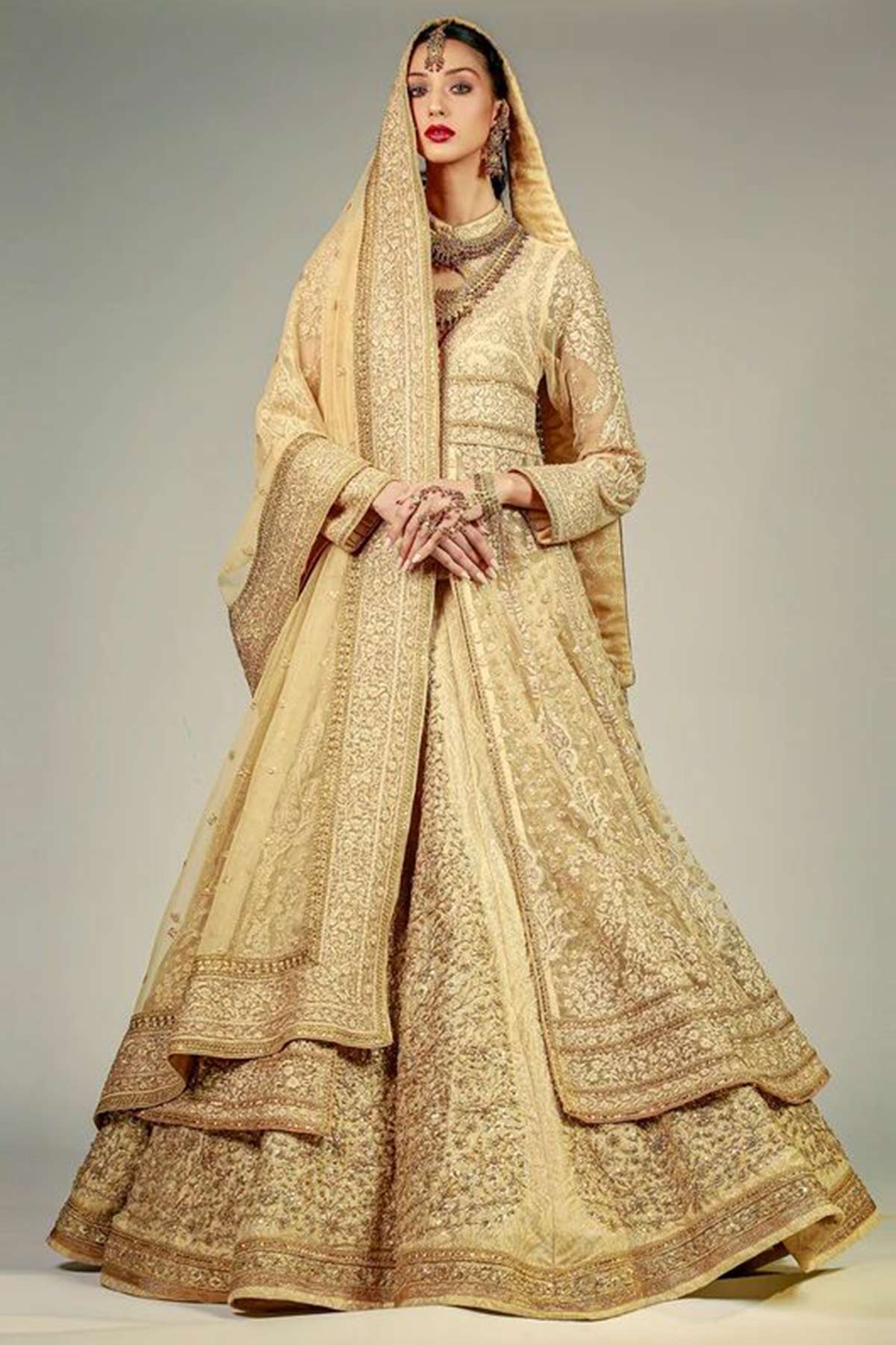 CLASSIC GOLD PESHWAZ WITH HEAVY DUPATTA AND LEHENGA - Rizwan Beyg