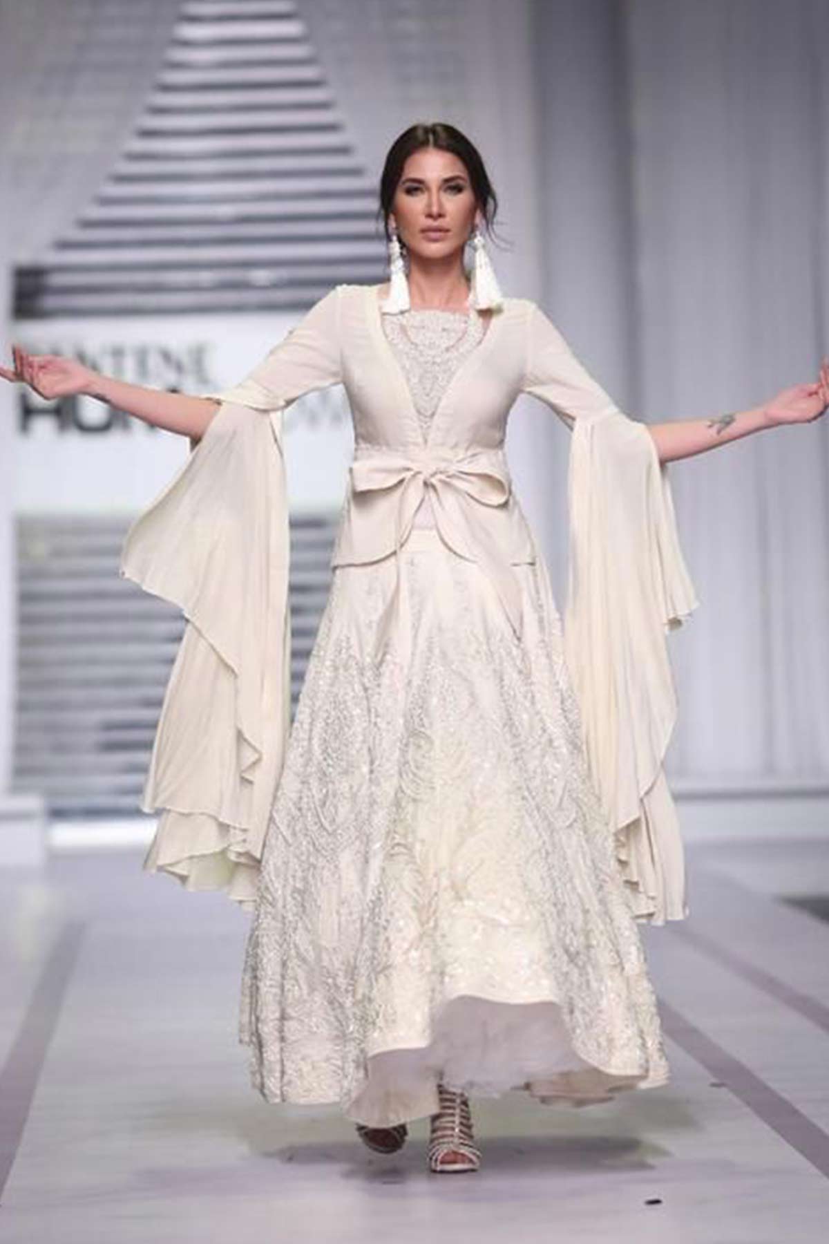 JACKET WITH TRAILING SLEEVES WORN WITH A PANELED LEHENGA - Rizwan Beyg